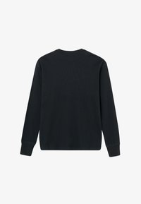 Svart sweatshirt med lange ermer, ribbestruktur og klassisk rund hals. Har mansjettarmer og rett kant.