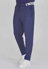 SIKSILK TAPERED FIT JOGGERS - Tracksuit bottoms - navy