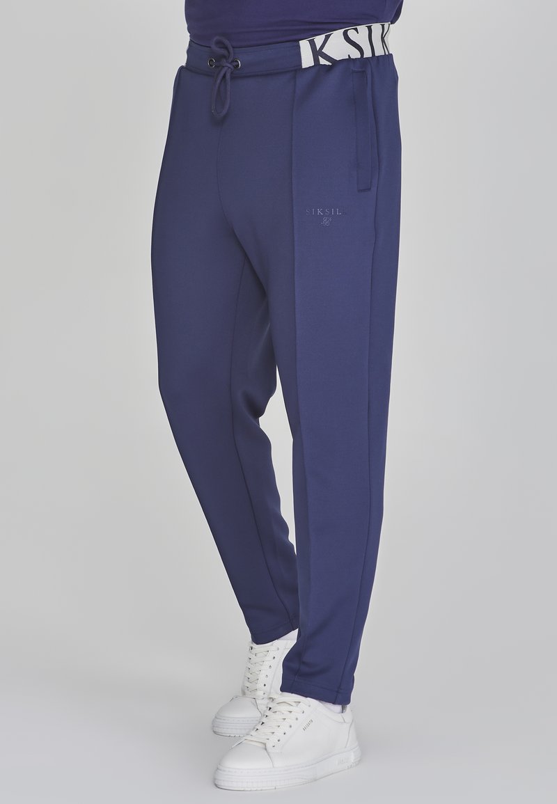 SIKSILK TAPERED FIT JOGGERS - Tracksuit bottoms - navy