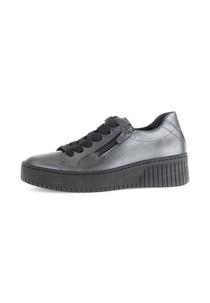 Black leather sneaker with a textured platform sole, lace-up design, and a side zip detail. Smooth finish with rounded toe shape.