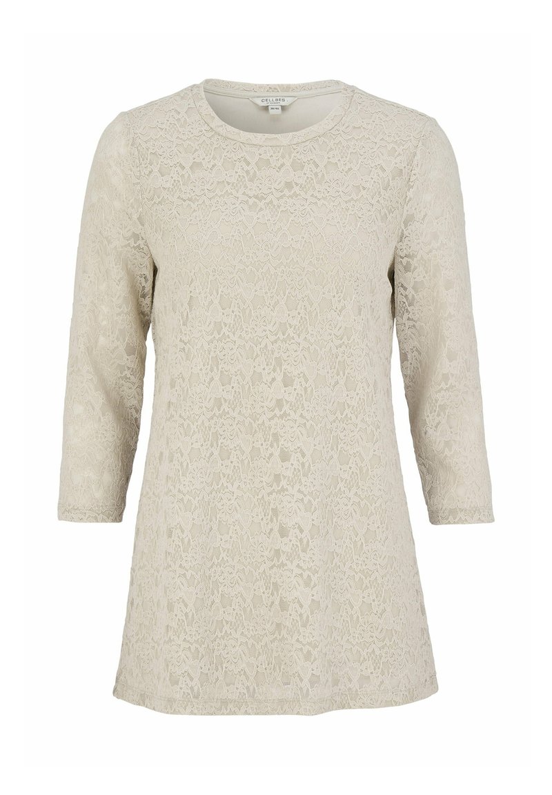 Blonde spids top i lys beige med trekvartærmer, rund halsudskæring og struktureret blomsterprint. Har en afslappet pasform og blødt materiale.