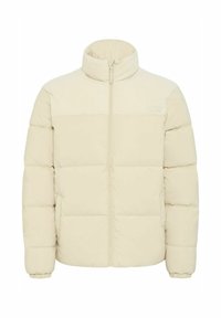 Chaqueta tipo puffer en color beige claro con una sección superior acanalada. Presenta un cierre frontal, puños elásticos y una textura acolchada.
