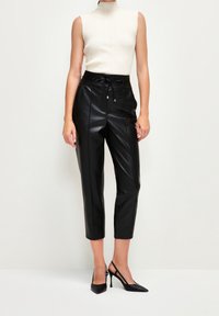 adL Tygbyxor - black