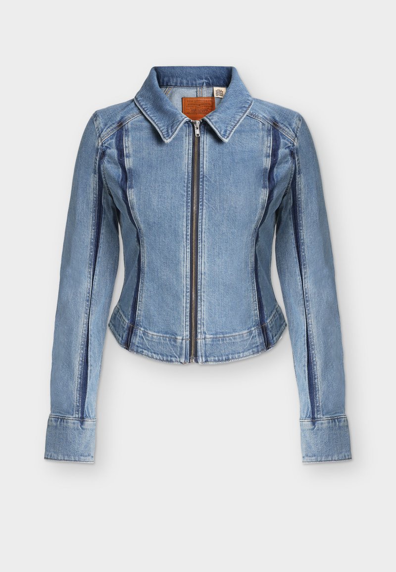 Ανοιχτό μπλε τζιν μπουφάν με μακριά μανίκια, κλείσιμο με φερμουάρ μπροστά, γιακά και πιο σκούρα ραφές στα μανίκια και τις πλευρές.