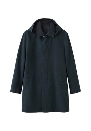 Mørkeblå hættejakke med skjulte knapper foran og to sidelommer, designet til både afslappet og formelt brug.