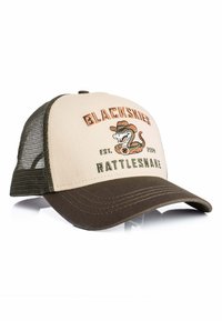 Bēšs un brūns truckera stila cepure ar tīkliņu aizmugurē, uz kuras ir karikatūras čūska ar kovboju cepuri un teksts "BLACKSKIES RATTLESNAKE EST. 2019".