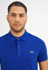 Lacoste Polo majica - captain