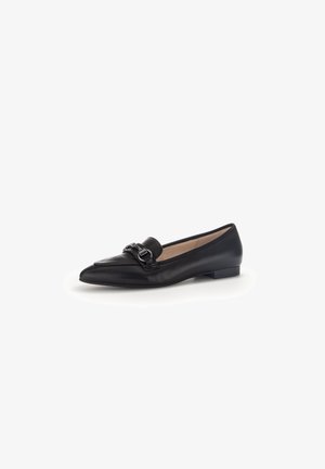 Black leather loafer with a pointed toe and flat heel, featuring a decorative buckle accent on the front and smooth texture.