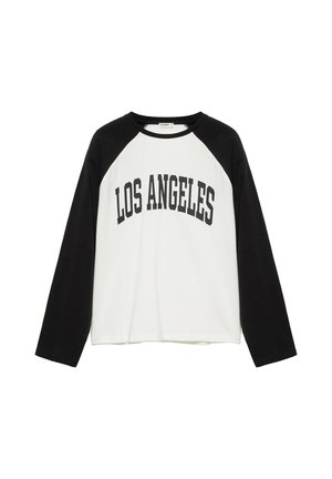 T-shirt raglan à manches longues avec manches noires et corps blanc, avec le texte "LOS ANGELES" en lettres noires en gras sur la poitrine.