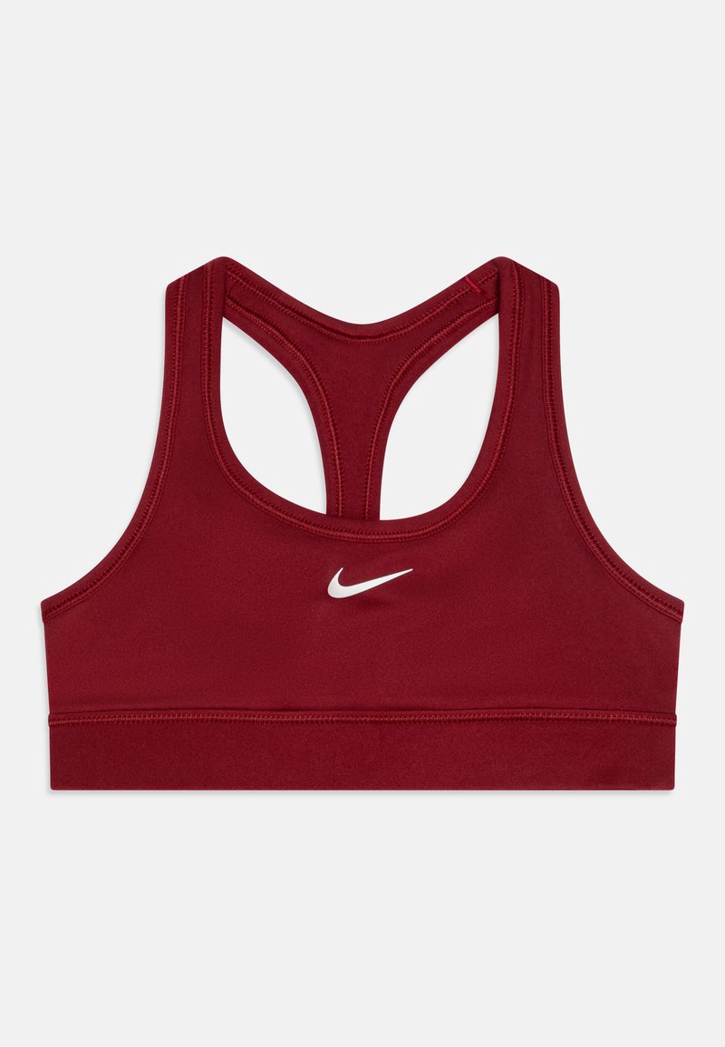 Rdeča športna modrček z obliko racerback, izdelan iz raztegljive tkanine. Ima bel Nike logotip spredaj in širok pas na dnu.