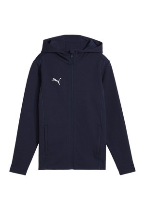 Sweat à zip bleu marine avec capuche, arborant un logo Puma blanc et des coutures accentuées en bleu clair. Fabriqué en tissu texturé et durable.