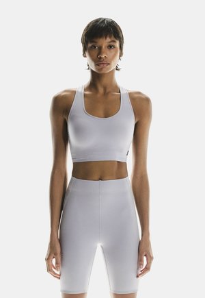 On TRAIN - Sport-bh met medium support - lilac