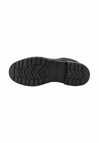 Suela de zapato de goma negra con un diseño de dibujo, que presenta ranuras y perforaciones para un mejor agarre y flexibilidad. La marca Geox es visible.