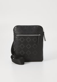 Black crossbody bag with a textured diamond pattern. Features a top zip closure and a front zip pocket. Fabric strap. Compact rectangular shape.