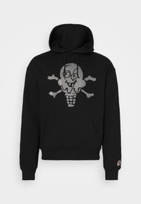 Black hoodie featuring a glittery ice cream skull graphic on the front, with a front pocket and ribbed cuffs. Small logo on the sleeve.