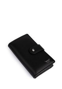 Black leather wallet with a snap button closure, smooth texture, and silver hardware. Logo embossed on the front corner. Rectangular shape.