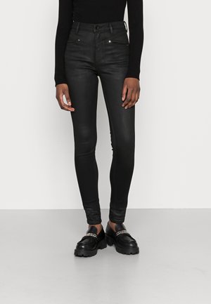 Guess Vaqueros pitillo - coated denim