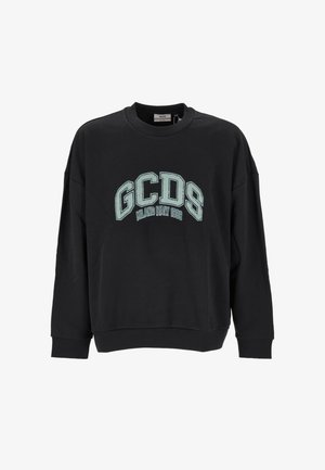 Schwarzes Sweatshirt mit Rundhalsausschnitt und langen Ärmeln, auf der Brust groß in Blockbuchstaben "GCDS Milano Italy 1988" aufgedruckt.