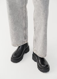 COSMO - Platform ankle boots - black