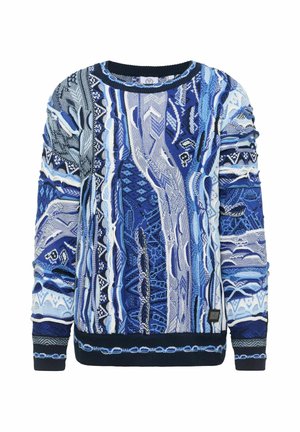Strikket sweater i blå nuancer med indviklede mønstre, kontrasterende teksturer og ribbede ærmekanter og kant. Inkluderer en lille logotag på siden.