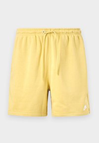 CLUB FLOW  - Tracksuit bottoms - saturn gold