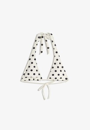 Witte bikinibovenkant met zwarte polkadots, driehoekige cups en strikjes bij nek en rug. Gemaakt van rekbare stof met geplooide naden.