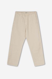 Pantalons en coton beige avec une coupe décontractée, dotés d'une taille à cordon de serrage, de poches latérales et d'un tissu légèrement texturé.