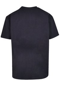 Black short-sleeve t-shirt made of smooth cotton fabric. Features a round crew neckline and a relaxed fit with a straight hem.