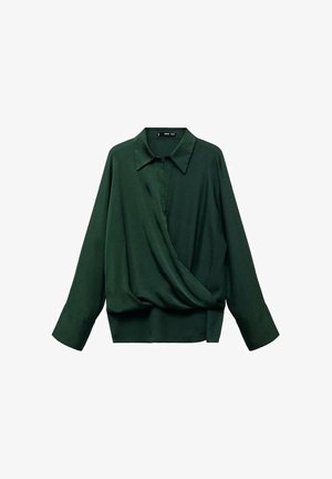 Blouse enveloppante vert foncé avec un col, des manches longues et une coupe oversize. Tissu lisse avec une texture douce. Longueur crop au niveau de la taille.