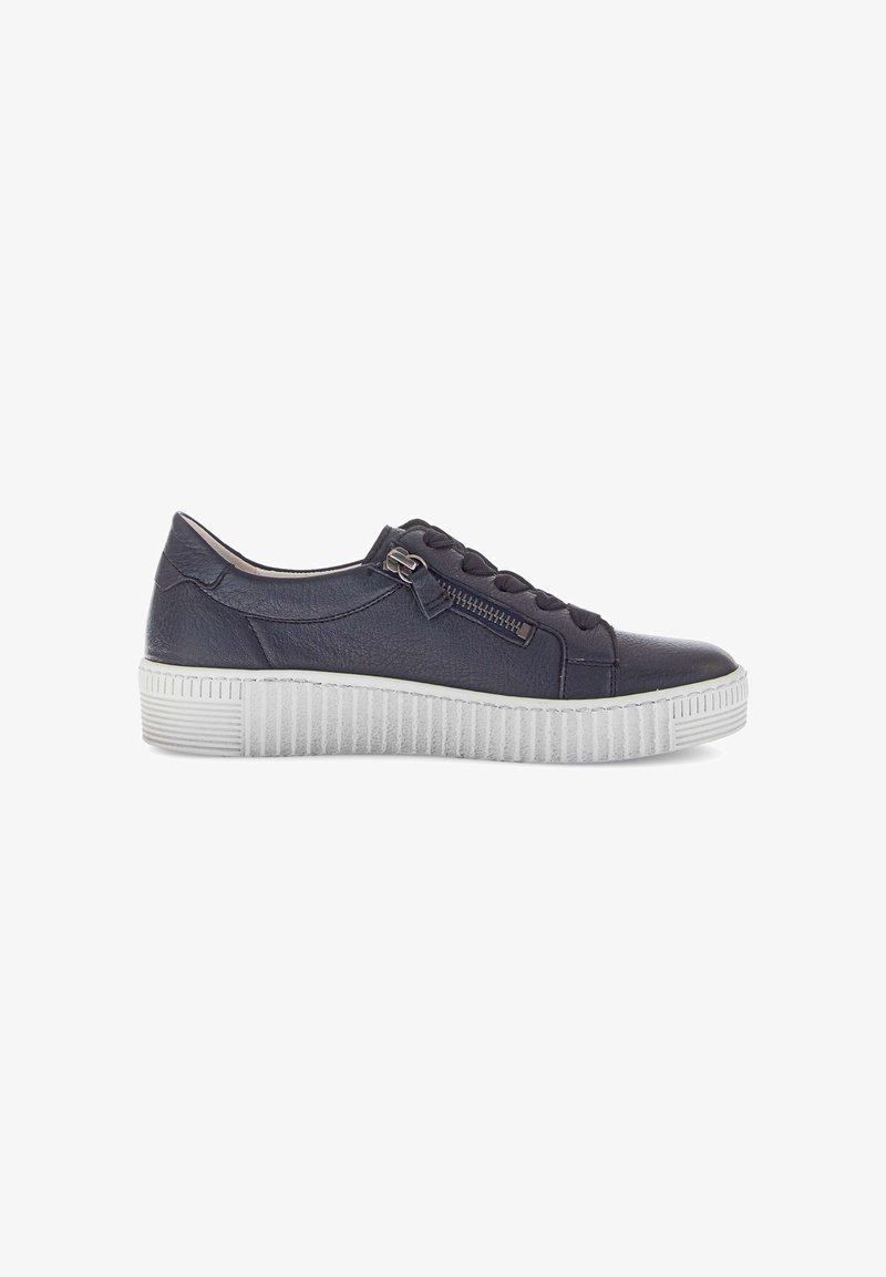 Navy leather sneaker with a textured finish, featuring a side zipper and lace-up front. White ridged sole for comfort and grip.