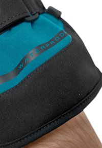 Waterproof leg strap features a solid black base with a vibrant blue upper section, displaying the word "WATERPROOF" in sleek black font.