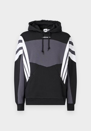 Bluza z kapturem wykonana z czarnej i szarej tkaniny z białymi akcentami. Posiada przednią kieszeń oraz trzy paski na rękawach. Prosty, sportowy design.