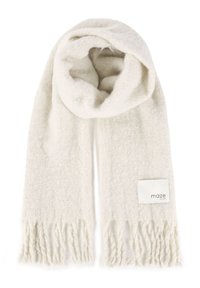 Kremowy, miękki dziany szalik z frędzlami na końcach i małą białą metką z napisem „maze” na jednolitym tle.