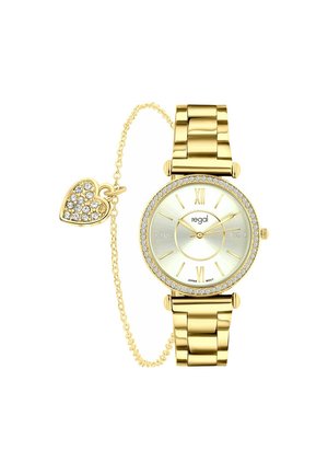 Goudkleurig horloge met een glanzende ronde wijzerplaat, kristallen accenten op de bezel, een gestructureerde band en een hartvormig bedeltje dat met een ketting is bevestigd.