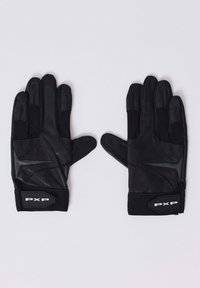 paire de gants de protection noirs avec paumes rembourrées et bandes velcro au poignet étiquetées "PXP", posée à plat avec les paumes vers le haut.