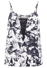 Czarnobiały top na ramiączkach z cienkimi paskami, z wstawką koronkową przy dekolcie. Luźny krój o lekkiej teksturze.
