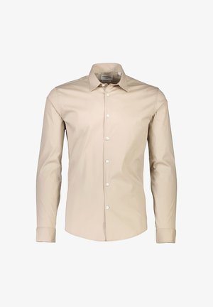 Camicia a maniche lunghe color beige chiaro realizzata in tessuto morbido, con colletto standard, chiusura con bottoni e polsini abbottonati.