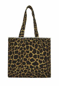 Tote bag met een bruine en zwarte luipaardprint en twee bijpassende schouderbanden, met een zilveren franjestrand bovenaan.