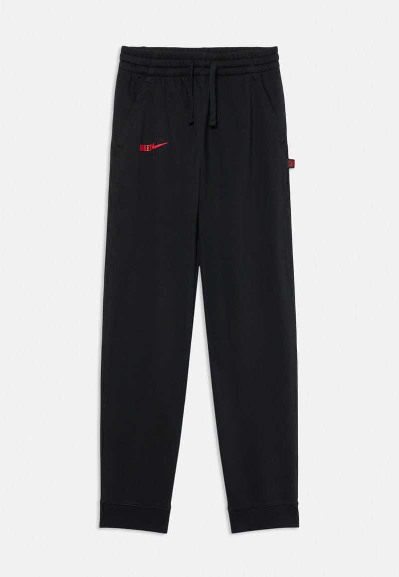Crne trenirke od mekanog materijala, s elastičnom širim u struku, bočnim džepovima i crvenim Nike logotipom s lijeve strane.