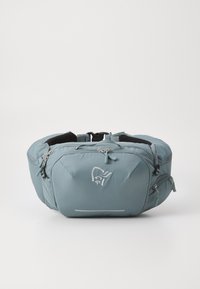 Soft teal waist bag made of durable material, featuring multiple zippered compartments, adjustable straps, and a reflective detail on the front.