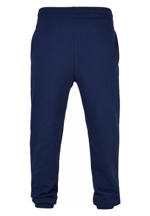 Mørkeblå joggebukser laget av myk bomullsblanding. Har elastisk midjebånd og ribbestrikkede ankler. Inkluderer sidelommer. Enkel design.