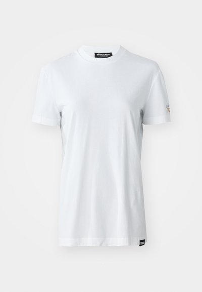 White cotton t-shirt with a round neckline, short sleeves, and a straight hem. Features a small logo detail on the left sleeve.