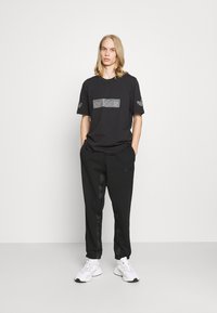 adidas Originals - Donji dijelovi trenirke - black Minijatura 1