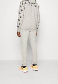 adidas Sportswear Träningsbyxor - grey
