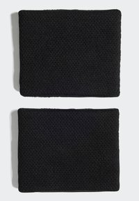 Melna adīta auduma galda paliktņi, taisnstūrveida forma, strukturēti ar blīvu austu. Divi galda paliktņi, sakrauti viens virs otra.