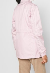 Nike Sportswear Tunn jacka - lilac