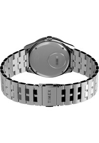 Montre en acier inoxydable argenté avec un bracelet à maillons et un boîtier rond élégant. Dispose d'un fermoir simple, sans éléments supplémentaires, et d'une finition lisse.