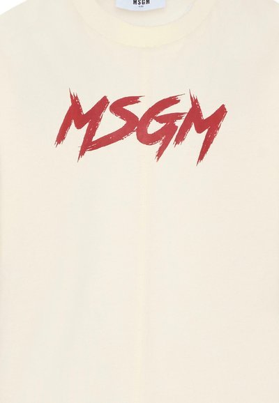 T-shirt in cotone color crema con logo "MSGM" in stile pennellata rossa sul davanti. Vestibilità standard e maniche corte.