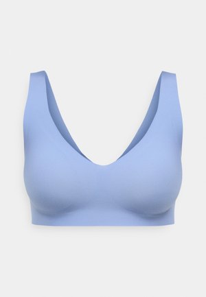 Hele sinine juhtmeta rinnahoidja sügava V-kujuga dekoltee, sileda tekstuuriga, laiade rihmadega ja nähtamatute kinnitusdetailidega, loodud mugavuse ja lihtsuse nimel.