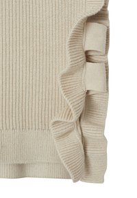 Beige Strickpullover mit geripptem Muster und einem gefransten Saum mit Schleifenakzenten auf einer Seite. Aus weichem und leichtem Material.
